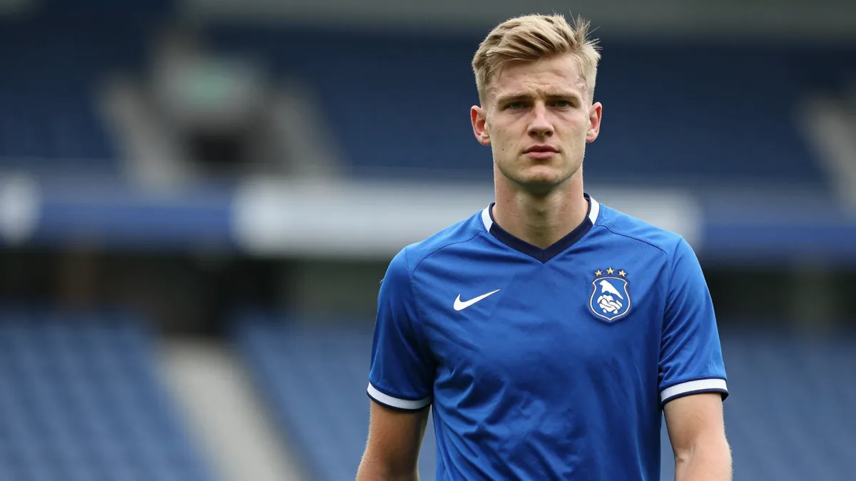 A photorealistic portrait of a 23-year-old Estonian football midfielder in a Portsmouth FC blue home kit, waist-up...